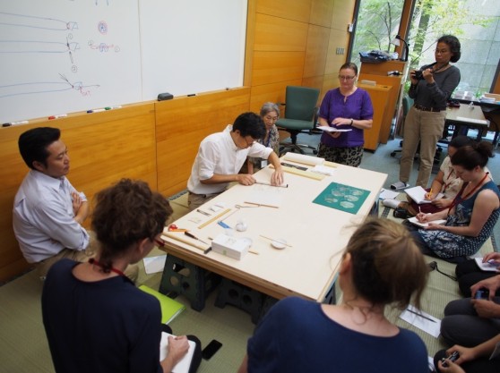 Participants learning from the main instructors, Makoto Kawabata and Atsushi Ogasawara.